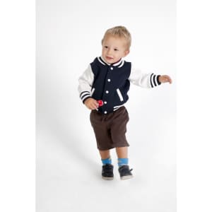 A toddlers' varsity jacket in navy blue and white, featuring striped cuffs, paired with brown shorts and playful socks.