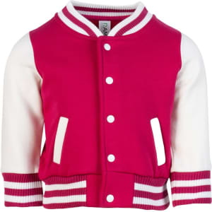 A pink and white babies varsity jacket with striped ribbing and a front button closure. It features a logo.