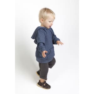 A blue babies' hoodie with a front pocket, worn by a toddler with light hair, standing on a white background.