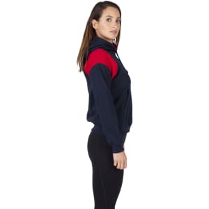 A women's juniors hoodie featuring a dark grey body and vibrant orange contrast panels, with a hood and long sleeves.