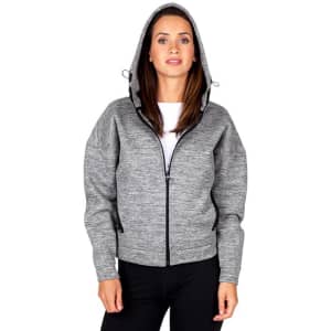 A grey women's juniors' hoodie with a full zip and hood, featuring side pockets and a relaxed fit.