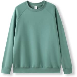 A green cotton sweatshirt with a crew neck and long sleeves. It has a logo on the label.