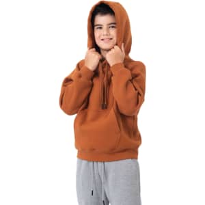 A child models a brown cotton hoodie with a kangaroo pocket and a drawstring hood, paired with grey pants.