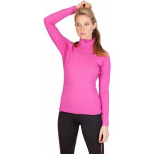 A woman wearing a bright pink half zip mock neck shirt, styled with long sleeves and a fitted look.