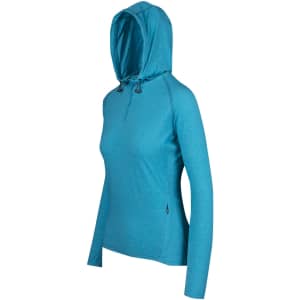 A teal half-hood top for women, featuring long sleeves and a comfortable fit, with a logo on the side.