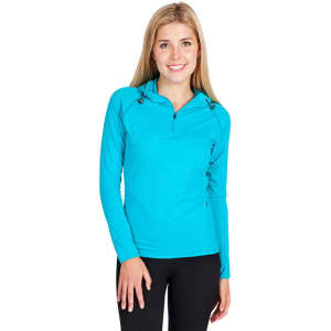 A woman wearing a vibrant turquoise half-hood top with long sleeves and a zippered neckline.