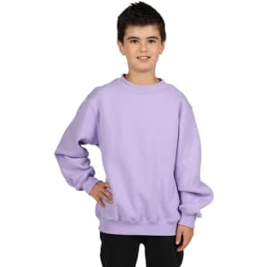 A light purple crew neck jumper for kids, featuring a relaxed fit. The model is standing with one hand on his hip.
