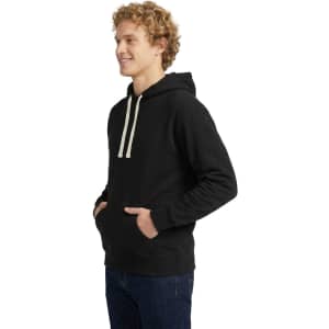 A blue men's brushed heavy fleece hoodie with a front pocket and drawstring hood, worn by a model.