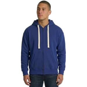 A man wearing a black brushed heavy zip fleece hoodie with a white drawstring and pockets.
