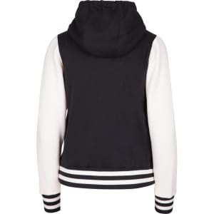 A women's varsity jacket in black and white with a hood and striped ribbed cuffs. Features a logo at the back.