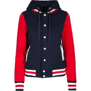 A women's varsity jacket in navy and red, featuring a hood, striped cuffs, and a branded logo.