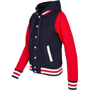 A women's varsity jacket with a navy body, red sleeves, and striped cuffs, featuring a hood and a logo.