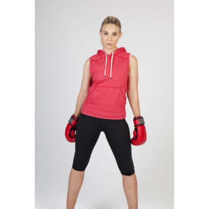 A woman wearing a red sleeveless hoodie and boxing gloves, standing confidently in a fighting stance.