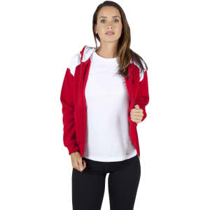 A red and white zip hoodie with a contrasting shoulder design, featuring a model wearing it over a white top.