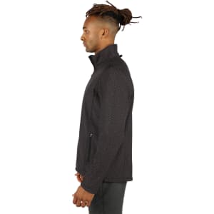 A men's black soft shell jacket with a textured pattern, featuring a zippered front and high collar.