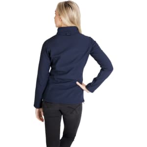 A navy women's soft shell jacket, featuring a high collar and a fitted design, shown from the back.