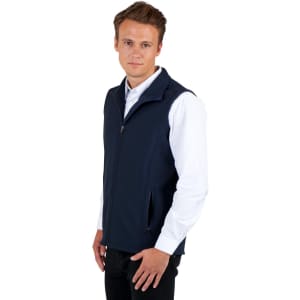 A navy blue men's soft shell vest from the TEMPEST range, featuring a zip front and pockets, worn with a white shirt.