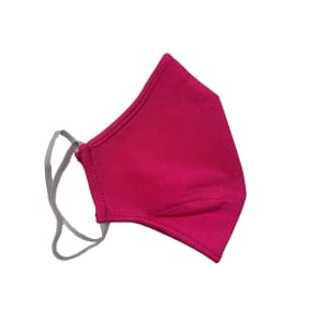 A fuchsia cotton face mask with elastic ear loops and a contoured design, featuring a logo.