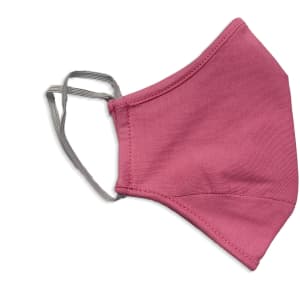A pink face mask made of 100% cotton with earpieces for secure wear. The mask features a simple design.
