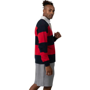 A men's unisex rugby polo in red and navy stripes, featuring a collared design and long sleeves. It has a logo.