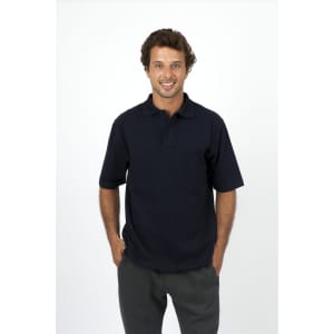 A man wearing a navy blue 100% cotton jersey polo shirt with a logo. He is smiling against a plain background.