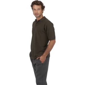 Men's cotton pigment dyed polo in dark green, featuring a collar and short sleeves, displayed on a model.
