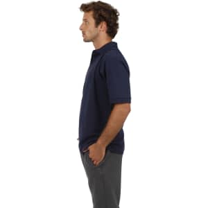 A navy blue men's cotton pique knit polo shirt with a collar, featured from the side.