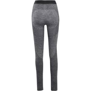 A pair of seamless leggings in a dark grey shade, featuring a stretchy waistband and a smooth finish.