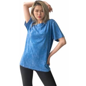 A unisex stone wash T-shirt in a maroon colour, featuring short sleeves and a relaxed fit.