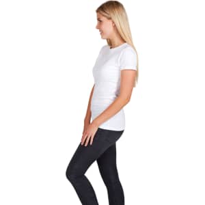 A white modern fit women's T-shirt displayed on a model wearing black jeans. The shirt has a simple design and a logo.