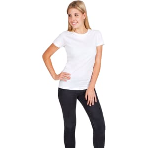A woman in a white modern fit T-shirt and a man in a black modern fit T-shirt, both wearing casual pants.