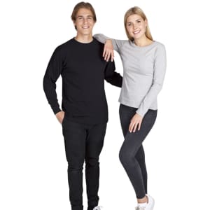 A black long sleeve T-shirt worn by a man and a grey long sleeve T-shirt worn by a woman, both with a logo.