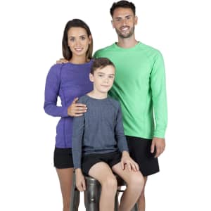 A green long sleeve t-shirt worn by a man, a purple long sleeve t-shirt worn by a woman, and a blue-grey long sleeve t-shirt worn by a boy.