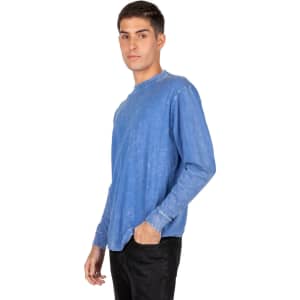 A long sleeve stone wash T-shirt in blue, featuring a casual fit and a logo on the design.