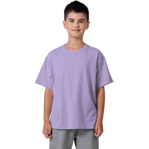 A purple kid's regular T-shirt displayed on a child, featuring short sleeves and a simple design.