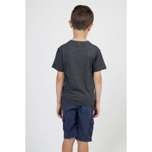 A boy wearing a dark grey heather T-shirt, standing with his back to the camera, paired with navy shorts.