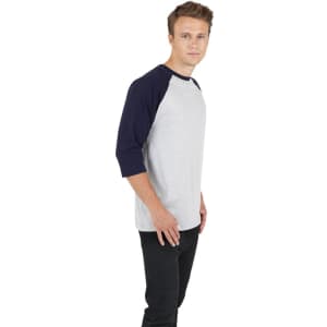 A light grey and navy blue unisex 3/4 sleeve raglan T-shirt displayed on a male model standing sideways.