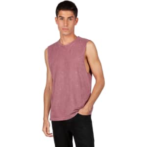 A sleeveless stone wash tank in a muted mauve colour, featuring a round neckline and a logo.