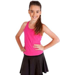 A girl wearing a bright pink singlet and a black skirt stands with her hands on her hips, smiling.
