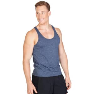 A man wearing a navy blue athletic T-back singlet with a logo, standing and smiling.