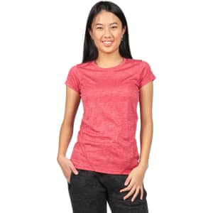 A woman is wearing a red 100% polyester T-shirt, featuring short sleeves and a relaxed fit, with a logo visible.