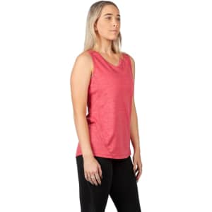 A pink women's singlet made of 100% polyester, featuring a smooth texture and a branded logo.
