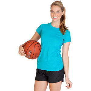 A woman in a turquoise athletic T-shirt holds a basketball while wearing black shorts. The shirt has a logo.