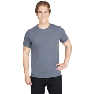 A grey men's heavy marl T-shirt is displayed on a model standing with one hand on his hip.