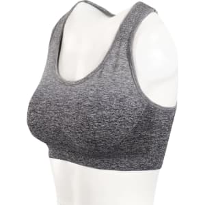 A grey seamless crop top displayed on a mannequin, featuring a simple design and a logo on the side.