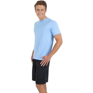 A light blue unisex t-shirt with short sleeves displayed on a male model wearing black shorts.