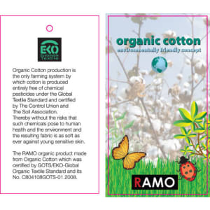 A tag featuring information about organic cotton production, with floral graphics, butterflies, and a ladybug. Colors include green and pink.
