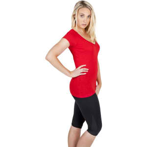 A red V-neck T-shirt in raw cotton, paired with black fitted shorts, on a model with long blonde hair.