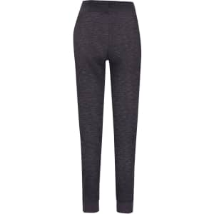 Brushed fleece track pants in a dark grey colour, featuring a tapered fit and an elastic waistband.