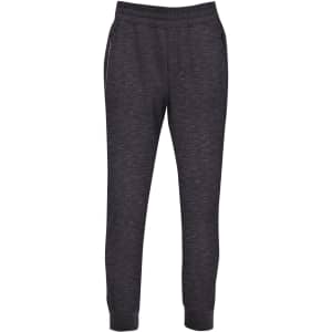 Brushed fleece track pants in a dark grey colour, featuring an elastic waistband and side pockets.